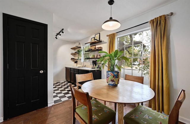 3902 Peterson Ave Unit 203, Austin, TX 78756 - dining area with track lighting and dark wood finished floors