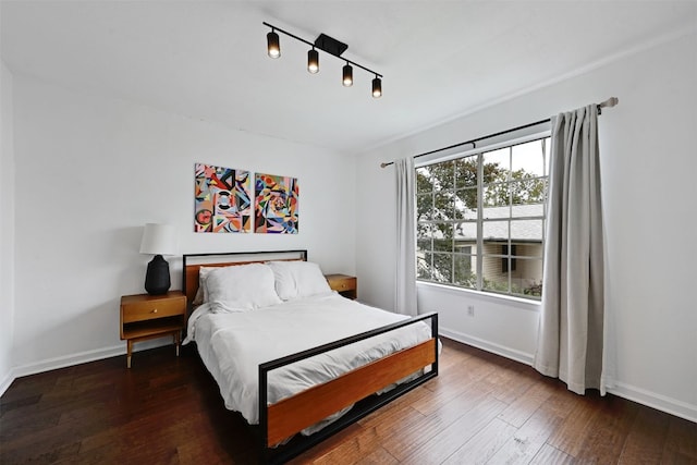 3902 Peterson Ave Unit 203, Austin, TX 78756 - bedroom featuring wood-type flooring and baseboards