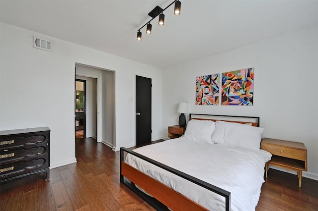 3902 Peterson Ave Unit 203, Austin, TX 78756 - bedroom with wood finished floors and baseboards