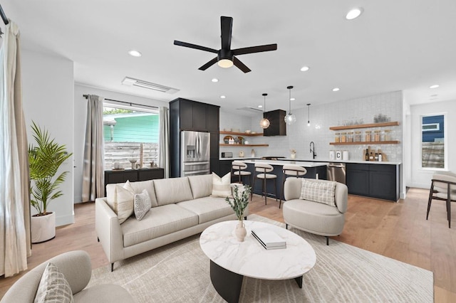504 Normandy St Unit A, Austin, TX 78745 - living area featuring light wood-style flooring, ceiling fan, and recessed lighting