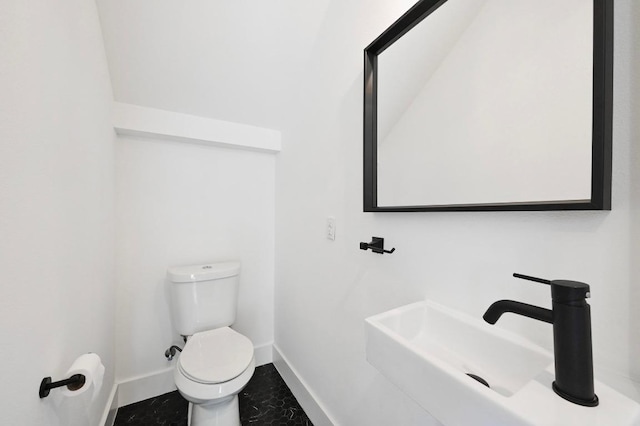 504 Normandy St Unit A, Austin, TX 78745 - bathroom with baseboards and toilet