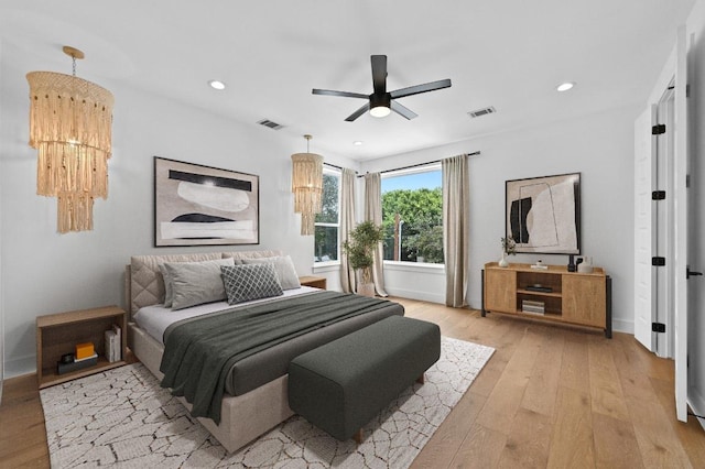 504 Normandy St Unit A, Austin, TX 78745 - bedroom with light wood finished floors, recessed lighting, and a ceiling fan