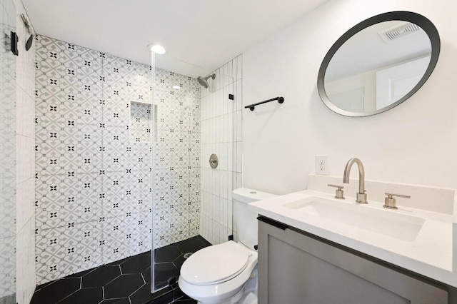 504 Normandy St Unit A, Austin, TX 78745 - full bath with tiled shower, vanity, and tile patterned flooring