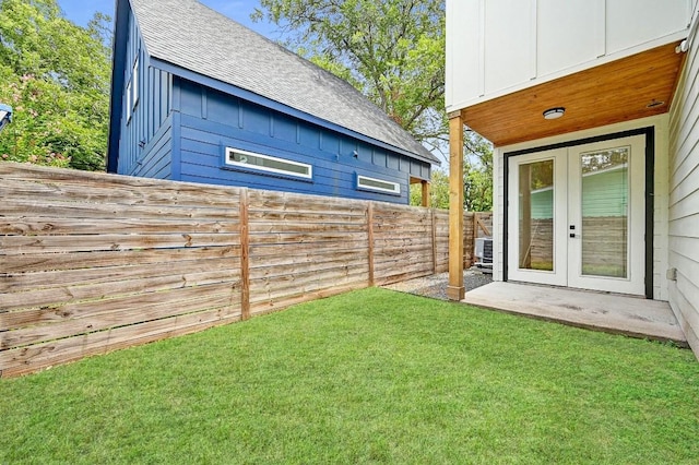 504 Normandy St Unit A, Austin, TX 78745 - fenced backyard featuring french doors