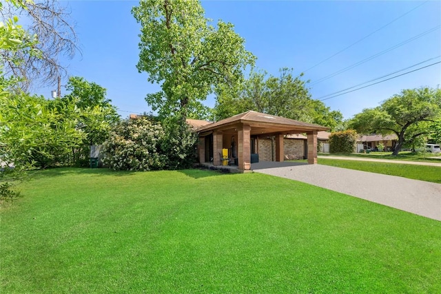 6201 Berkett Cv, Austin, TX 78745 - view of grassy yard featuring driveway