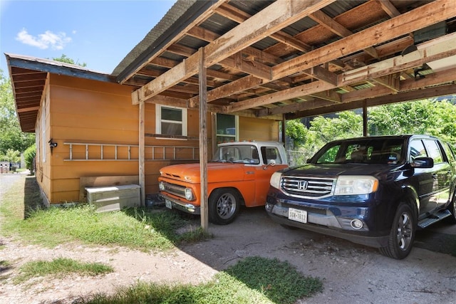 7105 Bethune Ave, Austin, TX 78752 - view of side of property featuring an attached carport