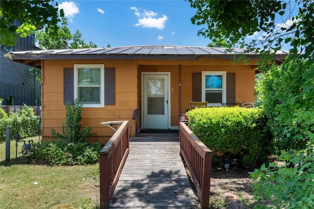 7105 Bethune Ave, Austin, TX 78752 - view of front of property with a standing seam roof and a metal roof