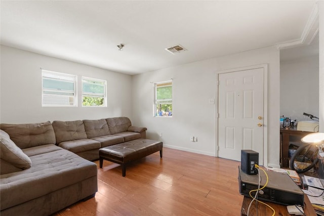 7105 Bethune Ave, Austin, TX 78752 - living area with light wood finished floors and baseboards