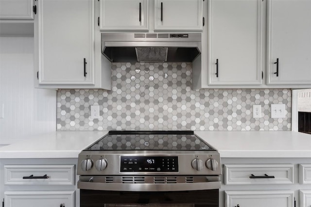 1107 Timmons Dr, Copperas Cove, TX 76522 - kitchen featuring electric stove, under cabinet range hood, light countertops, and tasteful backsplash