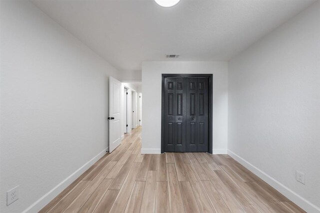 1107 Timmons Dr, Copperas Cove, TX 76522 - unfurnished bedroom featuring light wood-style floors and baseboards