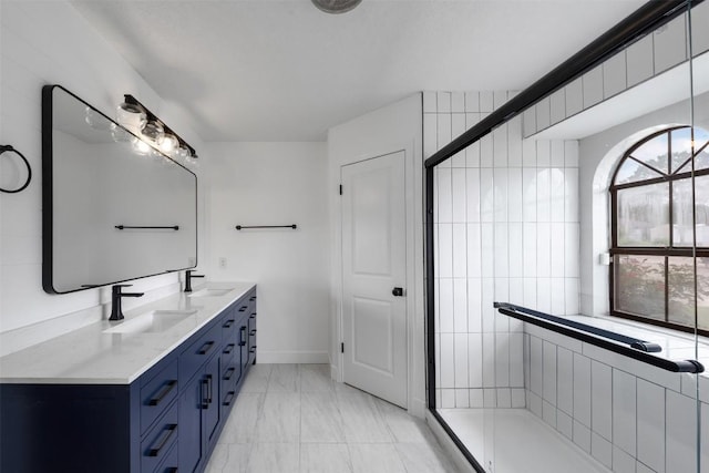 1107 Timmons Dr, Copperas Cove, TX 76522 - bathroom featuring double vanity, marble finish floors, and a shower stall