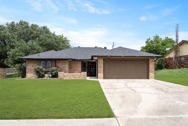 1107 Timmons Dr, Copperas Cove, TX 76522 - ranch-style house featuring brick siding, a front yard, an attached garage, and driveway