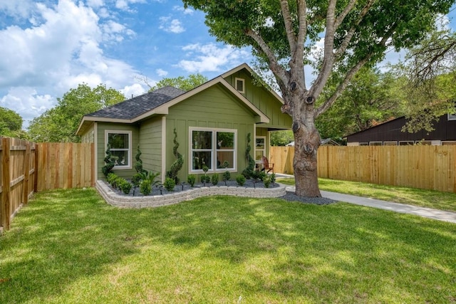 815 Fir Ln, Lockhart, TX 78644 - view of front of house featuring a fenced backyard and a shingled roof
