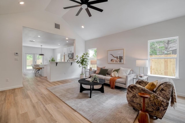 815 Fir Ln, Lockhart, TX 78644 - living room featuring ceiling fan, light wood-style flooring, recessed lighting, and high vaulted ceiling