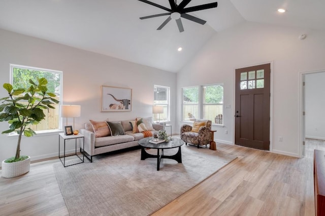 815 Fir Ln, Lockhart, TX 78644 - living area featuring high vaulted ceiling, light wood-style flooring, a ceiling fan, and recessed lighting
