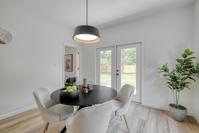 815 Fir Ln, Lockhart, TX 78644 - dining space with light wood finished floors and french doors