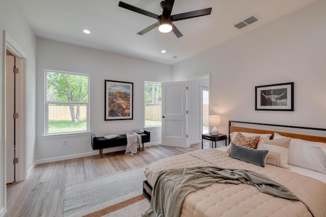 815 Fir Ln, Lockhart, TX 78644 - bedroom featuring light wood-style floors, recessed lighting, and ceiling fan