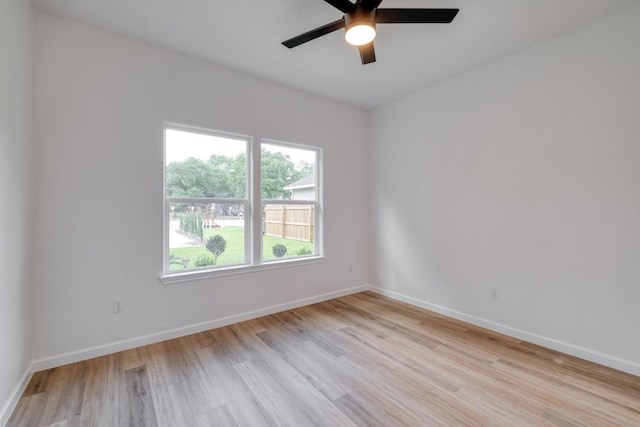 815 Fir Ln, Lockhart, TX 78644 - unfurnished room featuring light wood-style flooring and ceiling fan