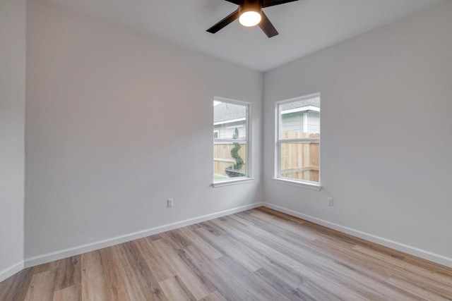 815 Fir Ln, Lockhart, TX 78644 - empty room featuring light wood-type flooring and a ceiling fan