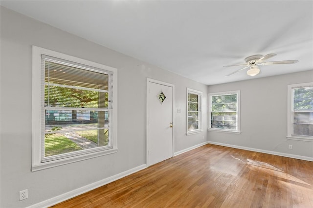1301 Piedmont Ave, Austin, TX 78757 - entrance foyer with wood finished floors and ceiling fan