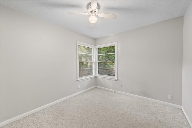 1301 Piedmont Ave, Austin, TX 78757 - carpeted empty room with a ceiling fan and a textured ceiling