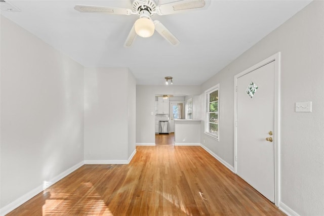 1301 Piedmont Ave, Austin, TX 78757 - foyer entrance featuring ceiling fan and wood finished floors