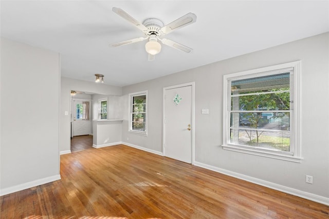 1301 Piedmont Ave, Austin, TX 78757 - foyer with wood finished floors and a ceiling fan