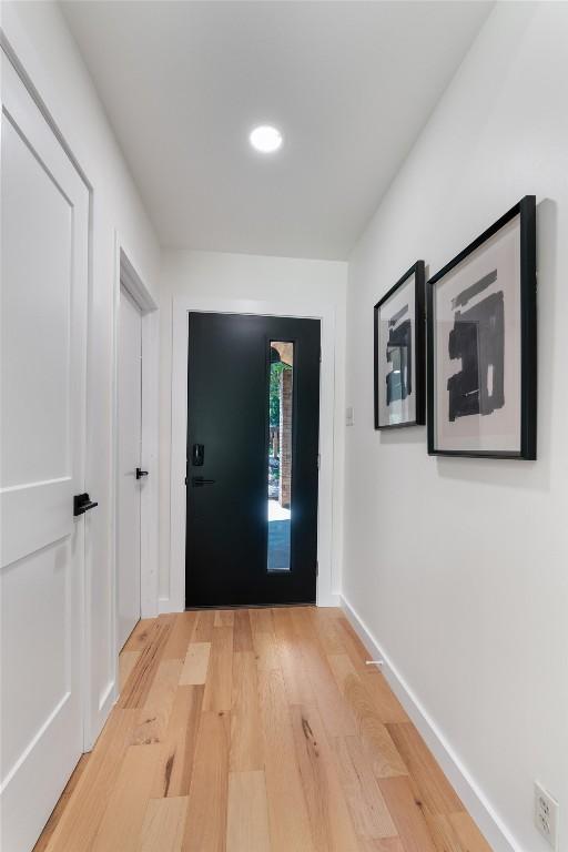6209 Waycross Dr, Austin, TX 78745 - entryway with light wood-type flooring and baseboards