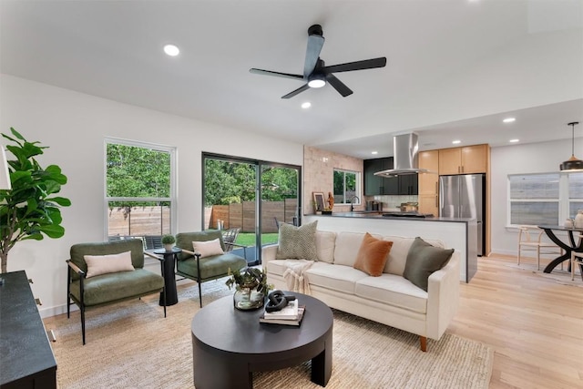 6209 Waycross Dr, Austin, TX 78745 - living room with light wood-style floors, recessed lighting, ceiling fan, and lofted ceiling