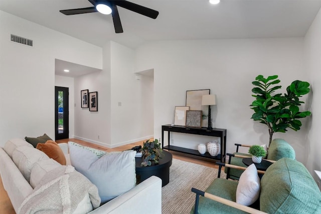 6209 Waycross Dr, Austin, TX 78745 - living area with vaulted ceiling, wood finished floors, ceiling fan, and recessed lighting