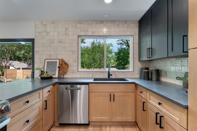 6209 Waycross Dr, Austin, TX 78745 - kitchen featuring stainless steel appliances, backsplash, light brown cabinetry, and dark countertops