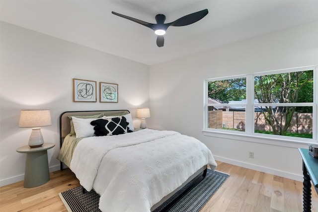 6209 Waycross Dr, Austin, TX 78745 - bedroom with multiple windows, wood finished floors, and ceiling fan
