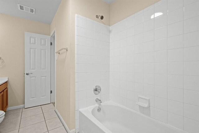 301 River Crossing Trl, Round Rock, TX 78665 - bathroom featuring vanity, tile patterned floors, and shower / washtub combination
