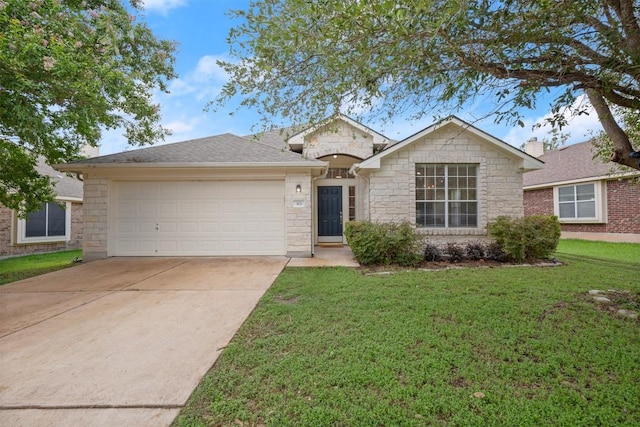 301 River Crossing Trl, Round Rock, TX 78665 - ranch-style house featuring concrete driveway, stone siding, an attached garage, and a front lawn