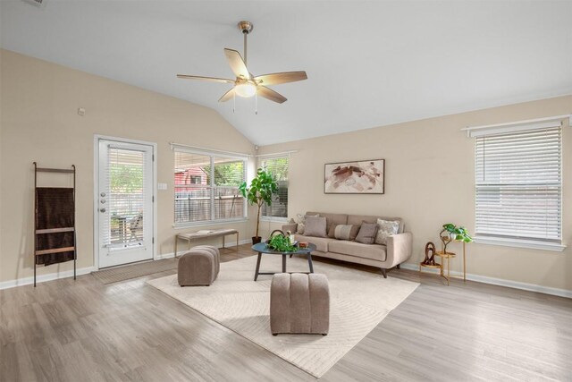 301 River Crossing Trl, Round Rock, TX 78665 - living room with light wood-style flooring, vaulted ceiling, and a ceiling fan