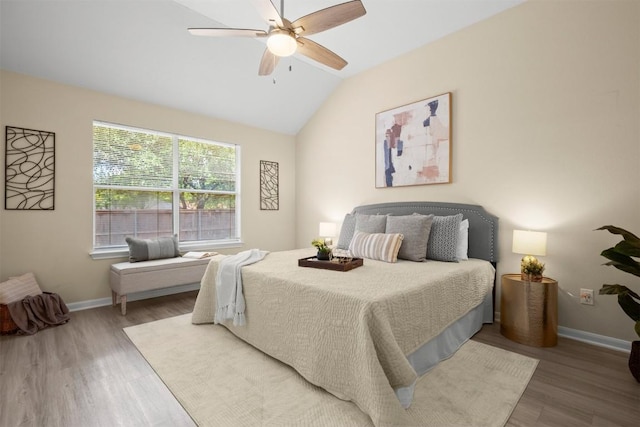 301 River Crossing Trl, Round Rock, TX 78665 - bedroom featuring wood finished floors, vaulted ceiling, and ceiling fan