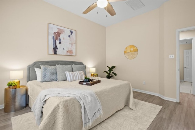 301 River Crossing Trl, Round Rock, TX 78665 - bedroom with wood finished floors and ceiling fan