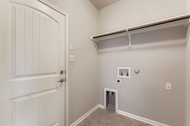 18920 Still Pond Rd, Pflugerville, TX 78660 - laundry room with electric dryer hookup, hookup for a gas dryer, washer hookup, and light tile patterned floors
