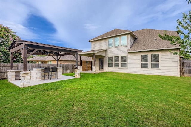 18920 Still Pond Rd, Pflugerville, TX 78660 - back of property with a fenced backyard, a patio, a shingled roof, and a gazebo