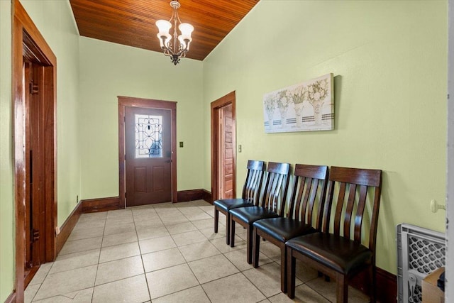 17205 County Line Rd, Elgin, TX 78621 - entrance foyer with wood ceiling, a chandelier, light tile patterned floors, and vaulted ceiling