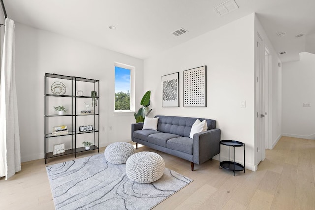 1713 E M Franklin Ave Unit 1, Austin, TX 78721 - living room with light wood-style floors and baseboards