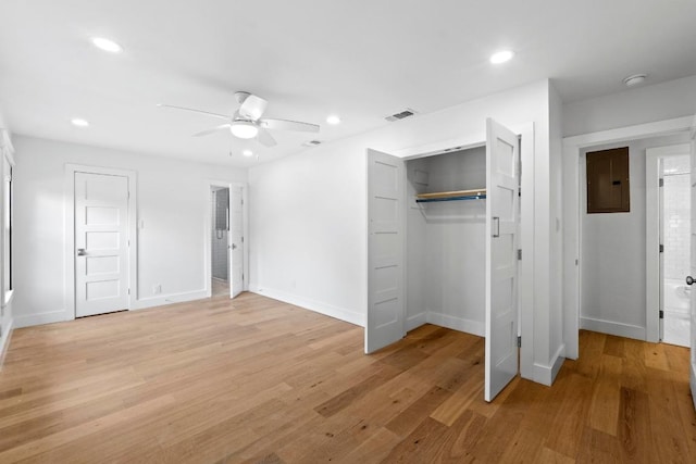 1701 Brentwood St, Austin, TX 78757 - unfurnished bedroom with electric panel, recessed lighting, light wood-style floors, ceiling fan, and a closet