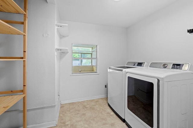 1701 Brentwood St, Austin, TX 78757 - washroom with washing machine and dryer and baseboards