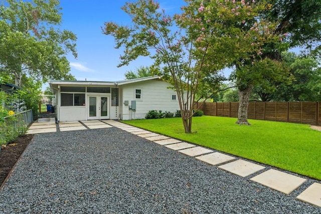 1701 Brentwood St, Austin, TX 78757 - back of house with french doors, a fenced backyard, and a patio area