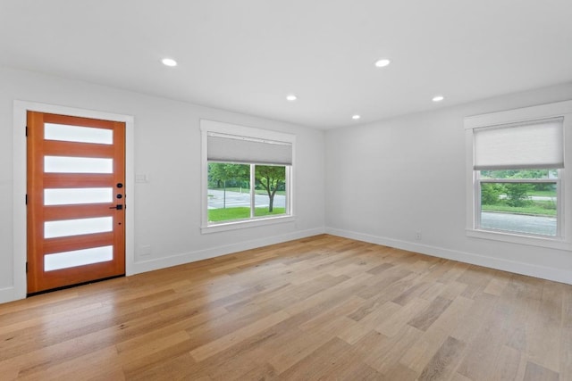 1701 Brentwood St, Austin, TX 78757 - entryway with light wood finished floors and recessed lighting