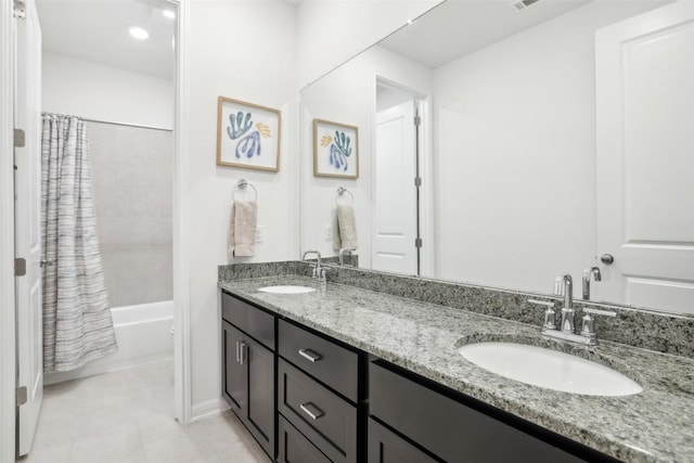 807 Arrowhead Ranch Blvd, Dripping Springs, TX 78620 - bathroom featuring double vanity, shower / bath combo, and tile patterned flooring