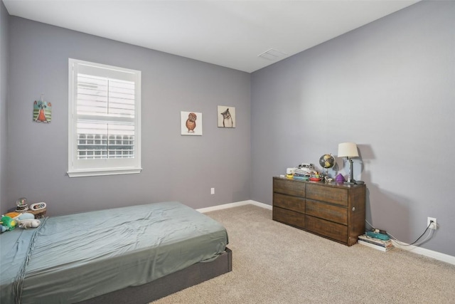 807 Arrowhead Ranch Blvd, Dripping Springs, TX 78620 - carpeted bedroom featuring baseboards