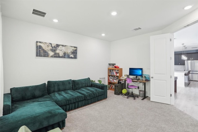 807 Arrowhead Ranch Blvd, Dripping Springs, TX 78620 - carpeted living room with recessed lighting