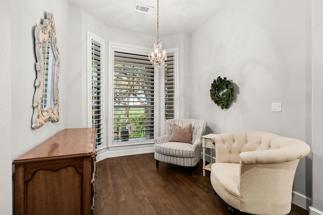 7800 SW Pkwy Unit 610, Austin, TX 78735 - sitting room featuring dark wood-style flooring, a chandelier, and plenty of natural light