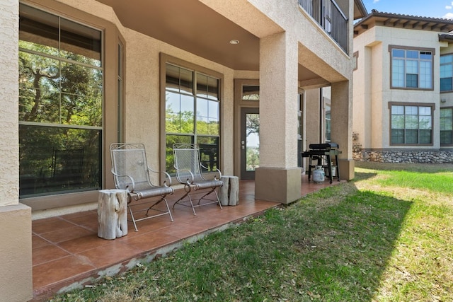 7800 SW Pkwy Unit 610, Austin, TX 78735 - porch with a grill and a lawn